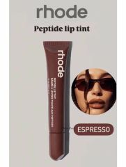 RHODE Увлажняющий тинт бальзам для губ Peptide Lip Tint Espresso Арт.: 50246 Тинт бальзам для губ Rhode Peptide Lip Tint Espresso удивительно увлажняет и питает нежную кожу губ, делая их мягкими и шел