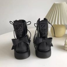 Ботинки с бантом женские