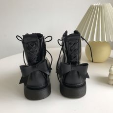 Ботинки с бантом